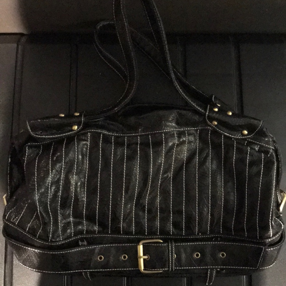 Small leather bag for sale.